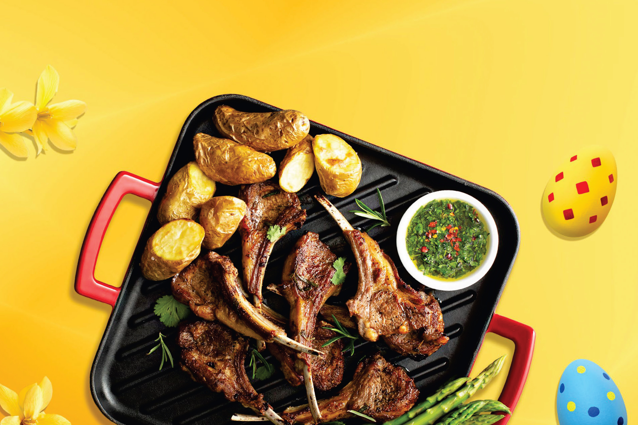 Агнешки котлети на скара с картофи, аспержи и сос, великденски яйца и цветя.