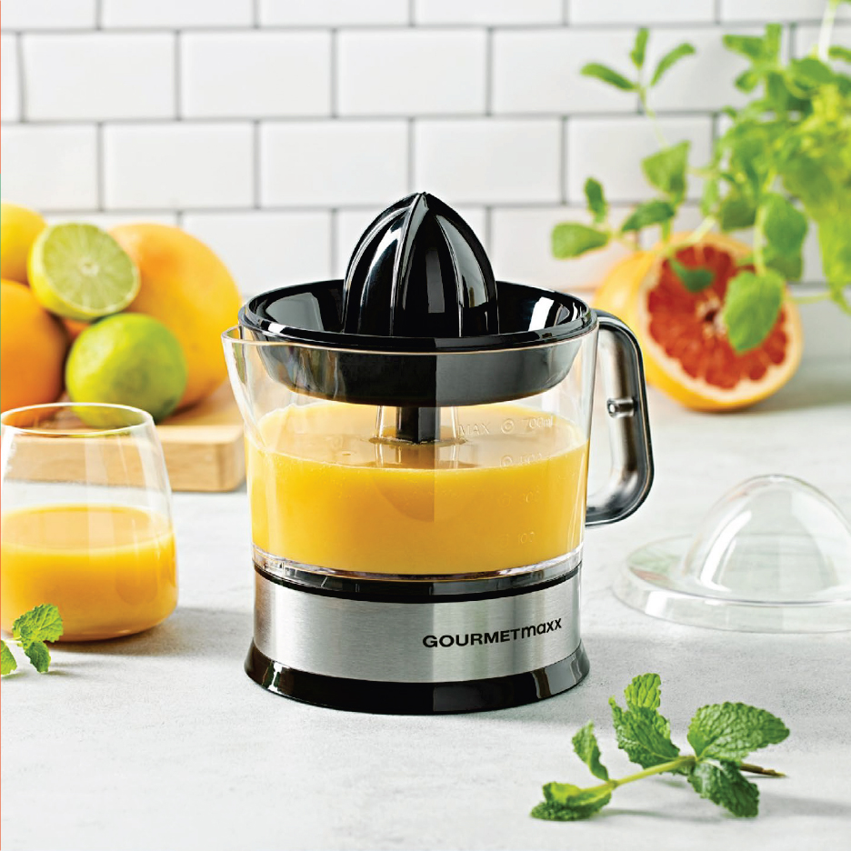 Електрическа цитрус преса Gourmetmaxx с портокалов сок, цитрусови плодове и мента.